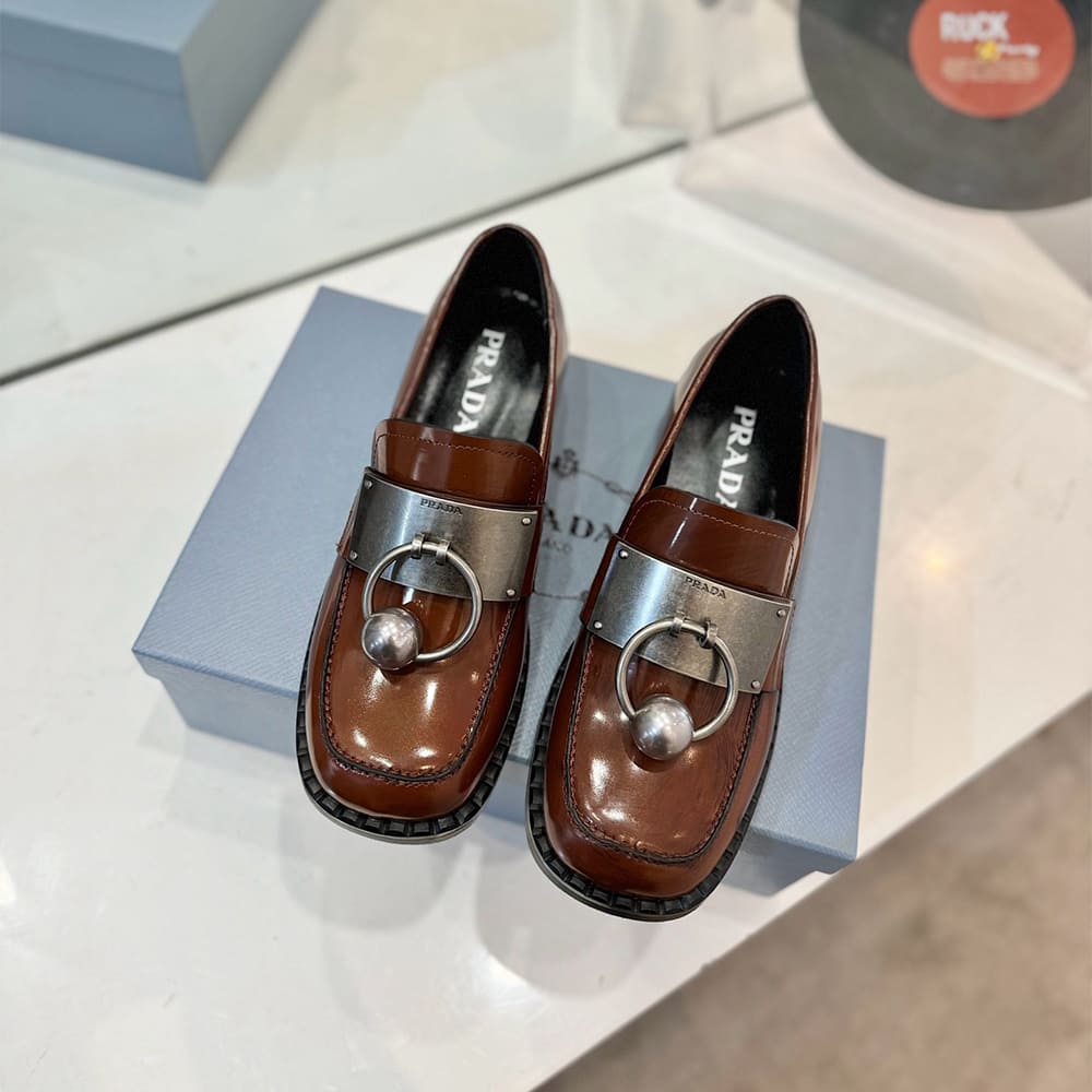 PRADA Brushed leather loafers with metal details