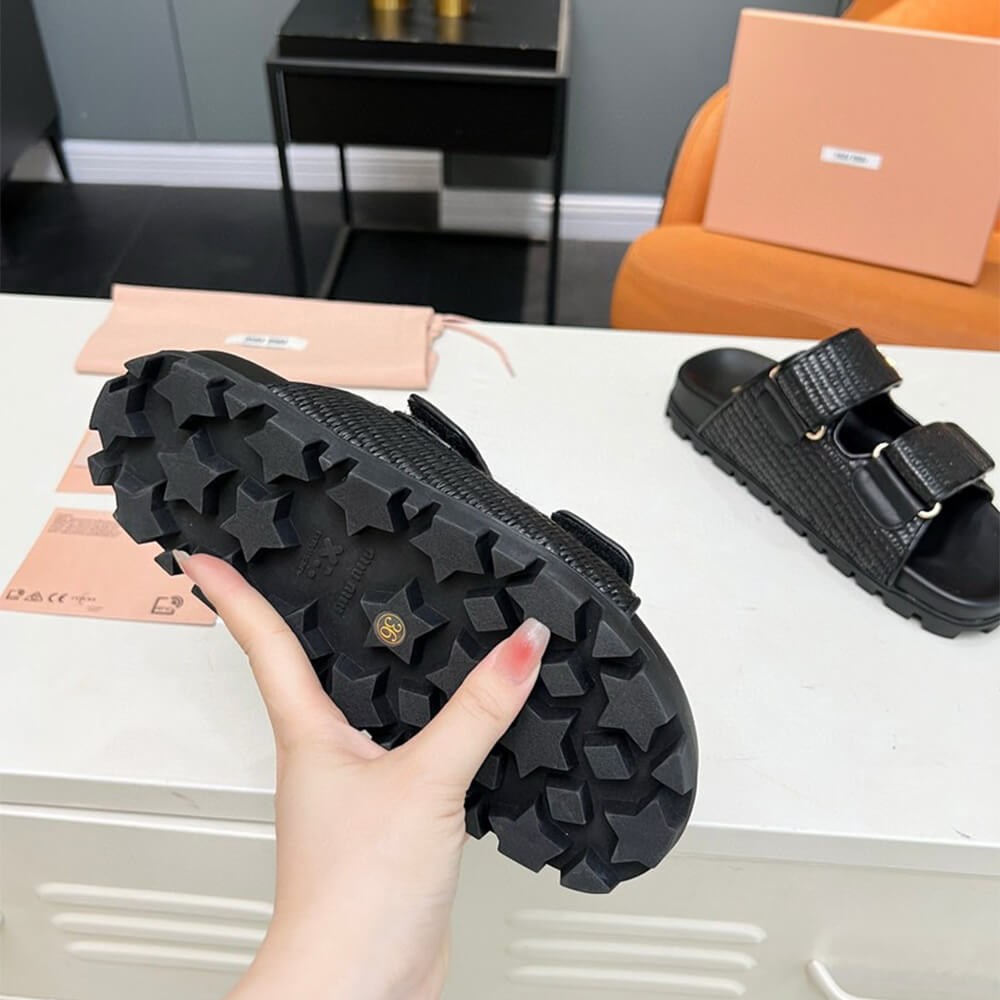 MiuMiu Raffia-effect woven fabric slides