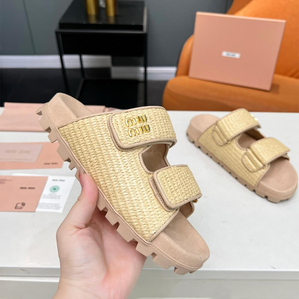 MiuMiu Raffia-effect woven fabric slides